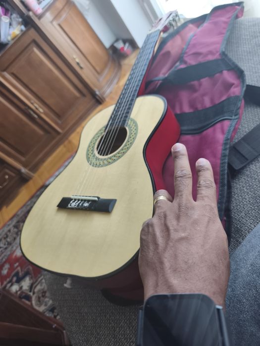 Aula  de violão ,com viola