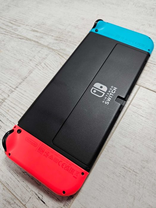 Nintendo Switch OLED Neon – idealny ekran, pudełko + gra TMNT – pełny zestaw