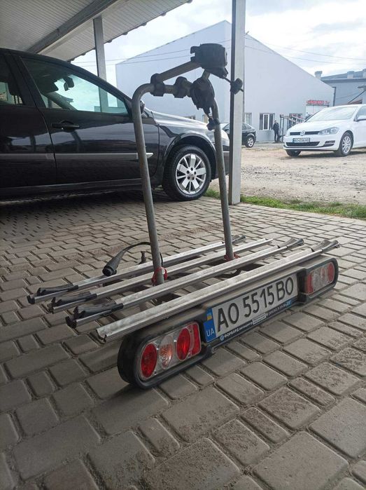 Кріплення для 4 велосипедів на фаркоп Menabo Race 4