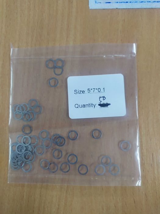 Регулююча прокладка шайба