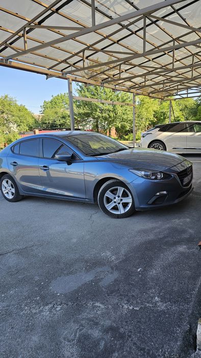Мазда 3 2015 рік