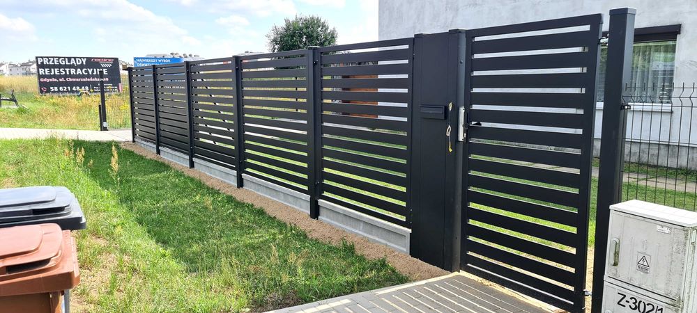 Ogrodzenie palisadowe, furtki, bramy, napędy- materiał plus montaż