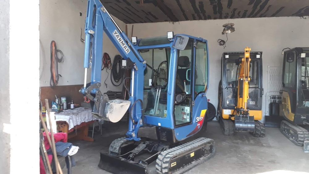 Minikoparka, usługi wodno - kanalizacyjne