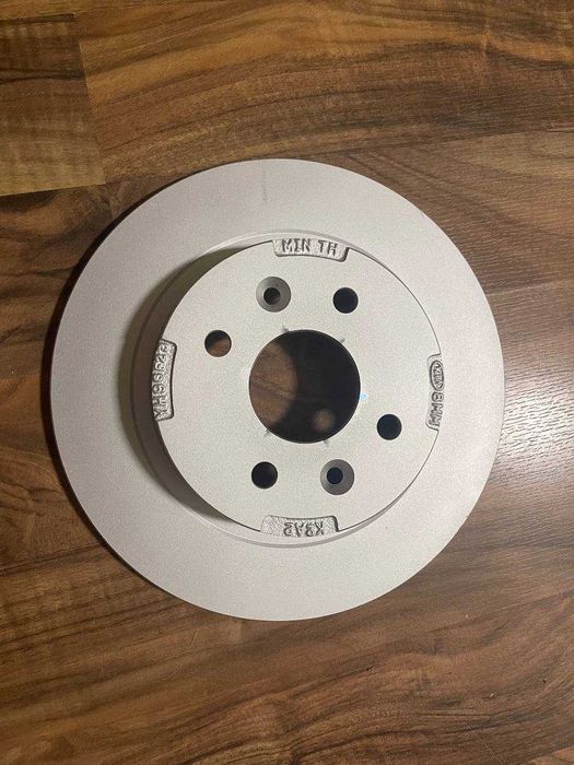 Нові диски тормозні задні KIA Cerato Sephia Shuma Spectra. Оригінал