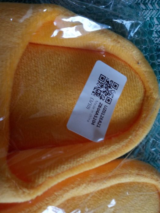 Нові дитячі тапочки