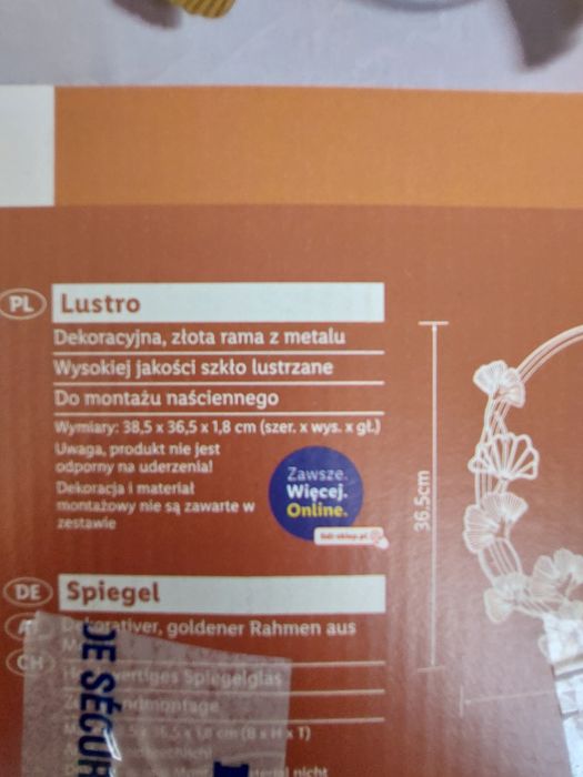 Lustro ze złotą ramą