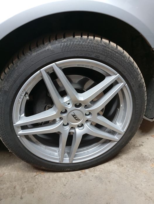 Felgi 5×112 18 cali z oponami Continental