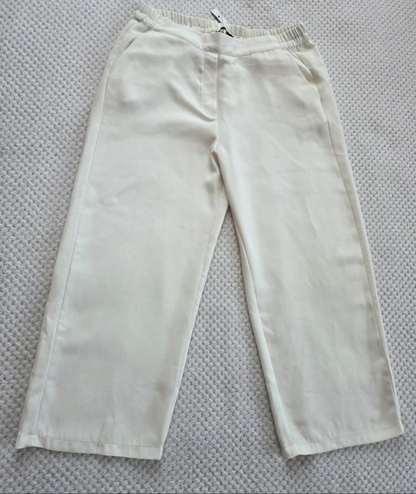 Nowe śmietankowe spodnie damskie kuloty 7/8 wysoki stan gumka w pasie