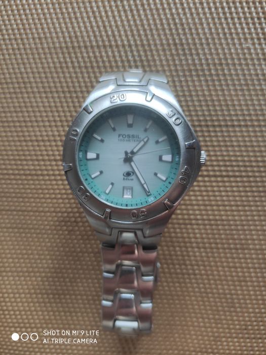 продам часы Fossil blue