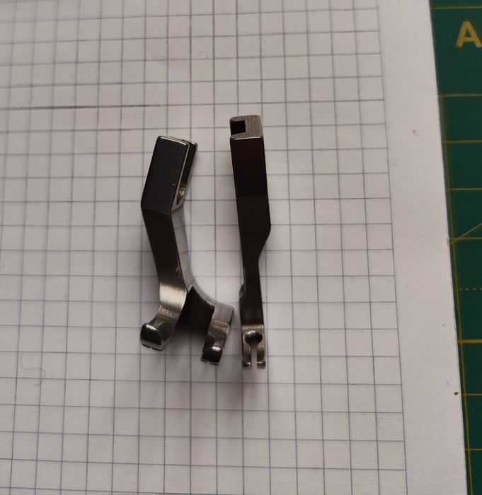 Крокуюча лапка для промислової швейної машини