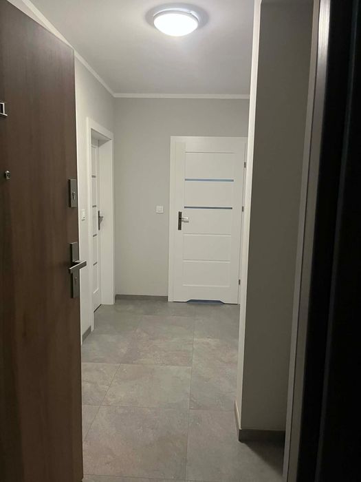 Apartament - 3 pokoje z ogródkiem i miejscem parkingowym w garażu