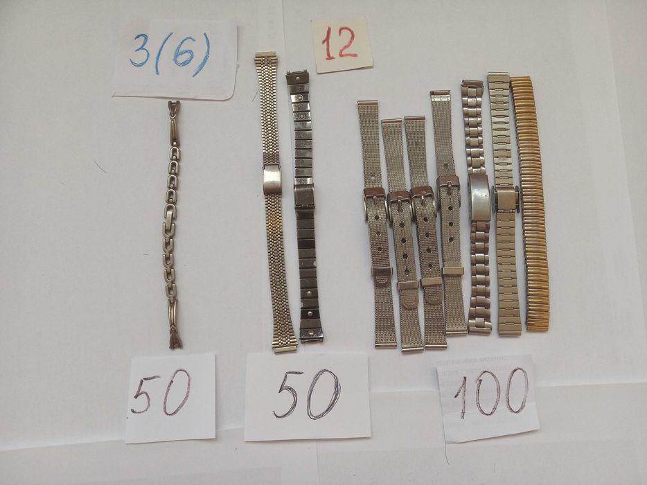 Металеві браслети до годинників