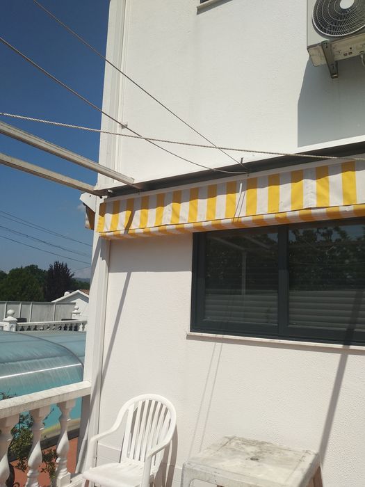 Pérgola de encostar com tecido