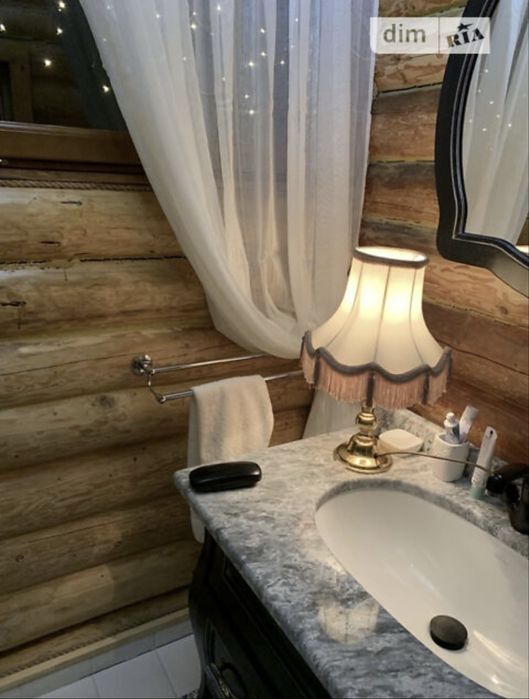 Продаж  дизайнерського будинку в Карпатах з великою ділянкою