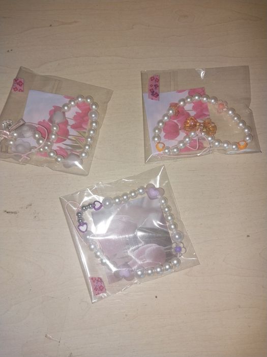 Підвісуи для телефону