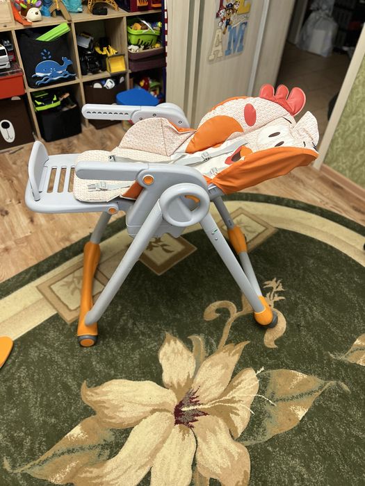 Продам дитячий  стільчик для  годування , фірми Chicco polly 25 star