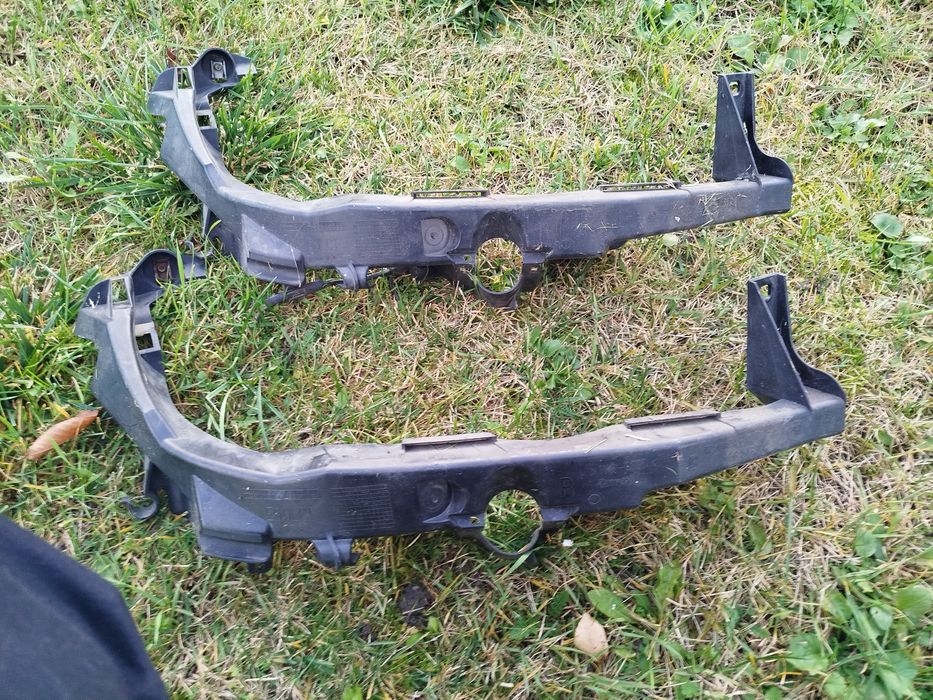 Slizg mocowanie lampy przód BMW E90 E91 lift prawy
