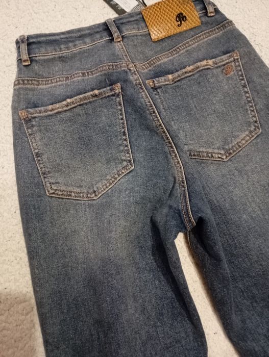 Новые женские джинсы