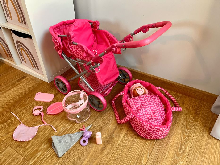 Składany wózek z grającym dzidziusiem