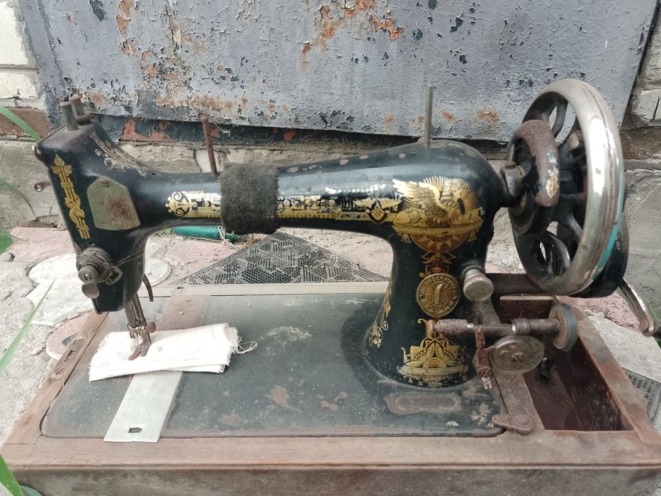 Швейная машинка Сингер