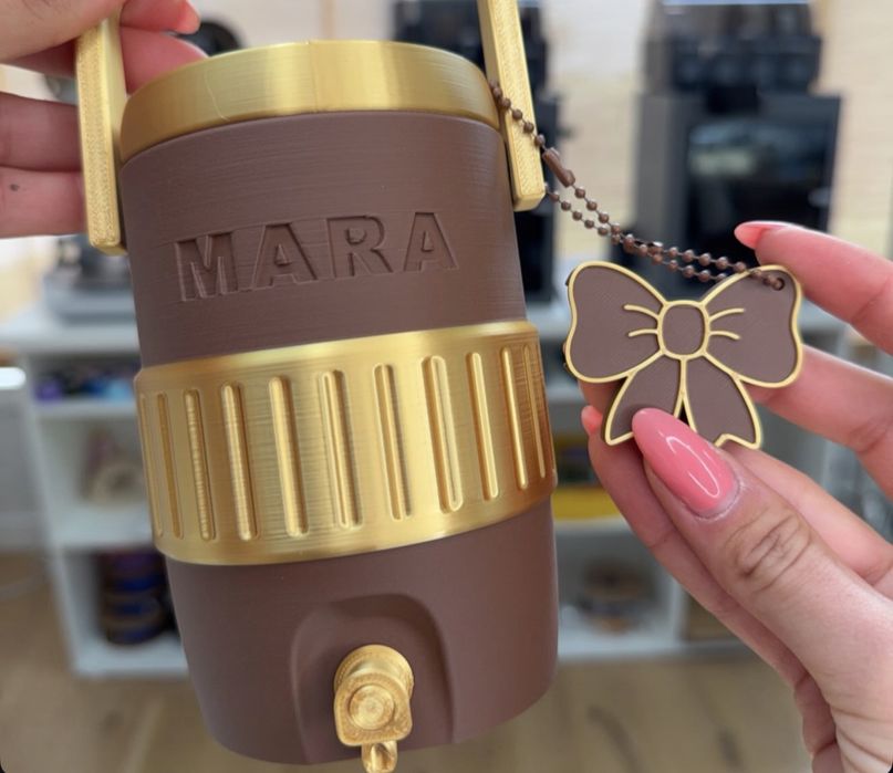 Porta lata com canudo e chaveiro