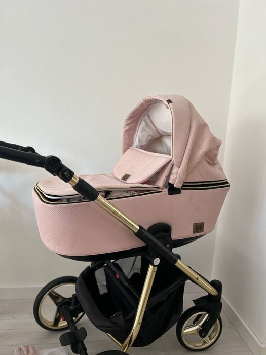 Różowy wózek dziecięce adamex 2w1