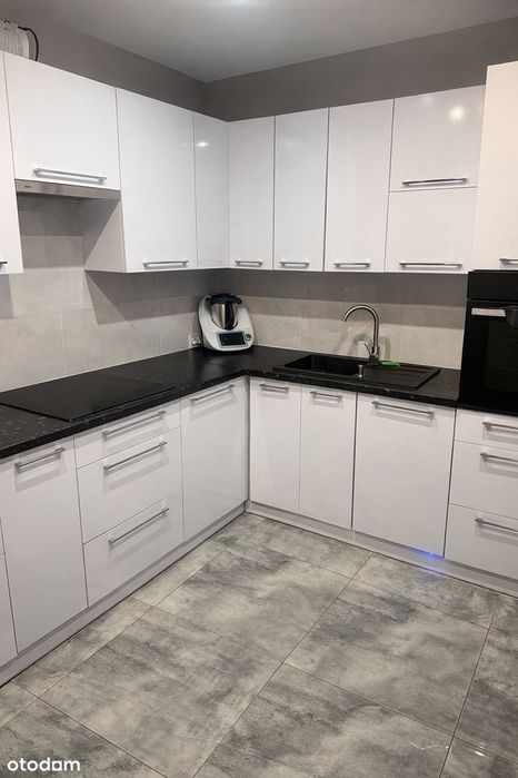 Mieszkanie 77 m² z garażem i działką