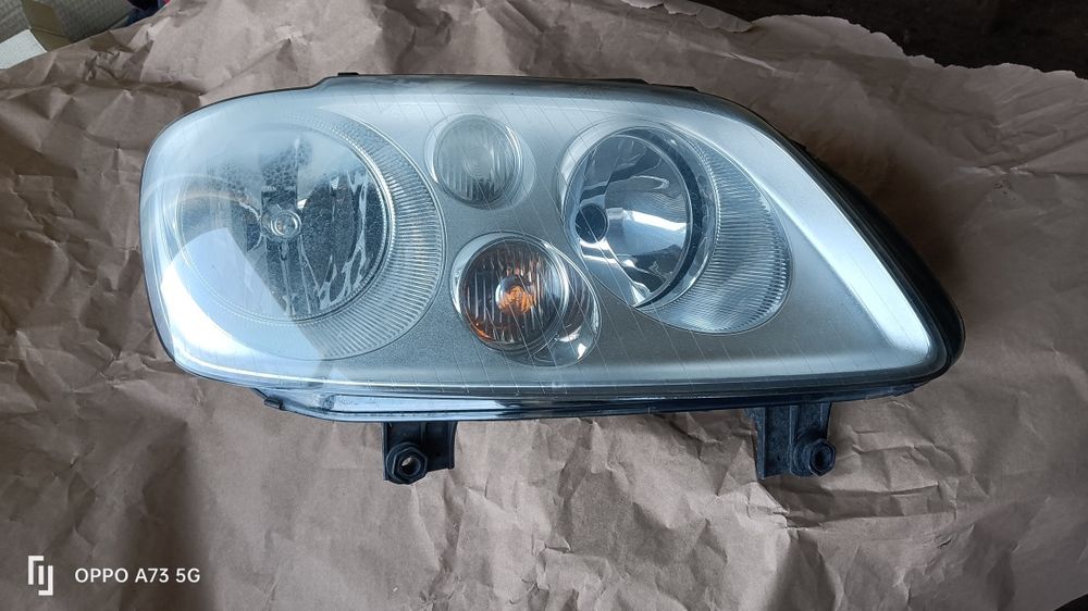 Farol VW touran ótica original óptica 2004