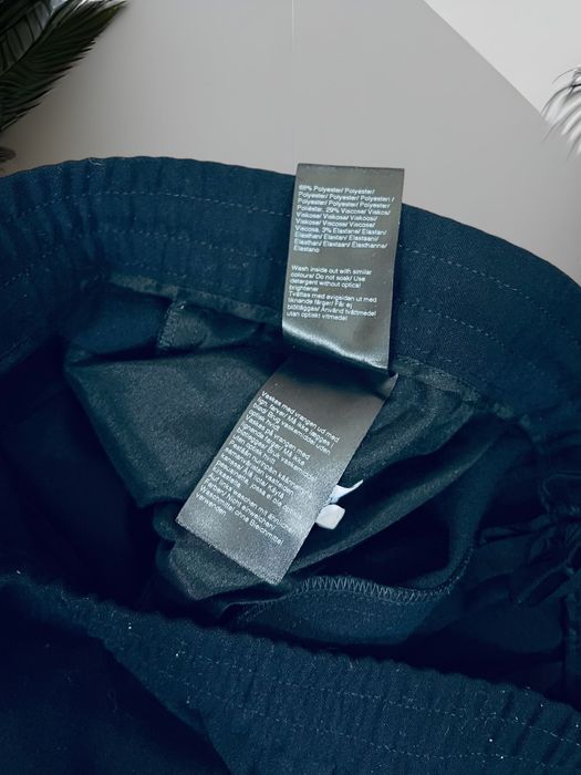 Filippa K roz. L damskie granatowe eleganckie spodnie