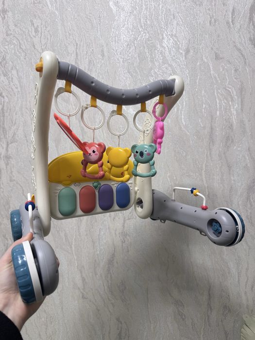 Розвиваюча іграшка та ходунки  музичні