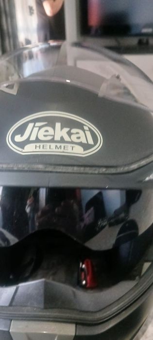 Capacete e luvas de motar
