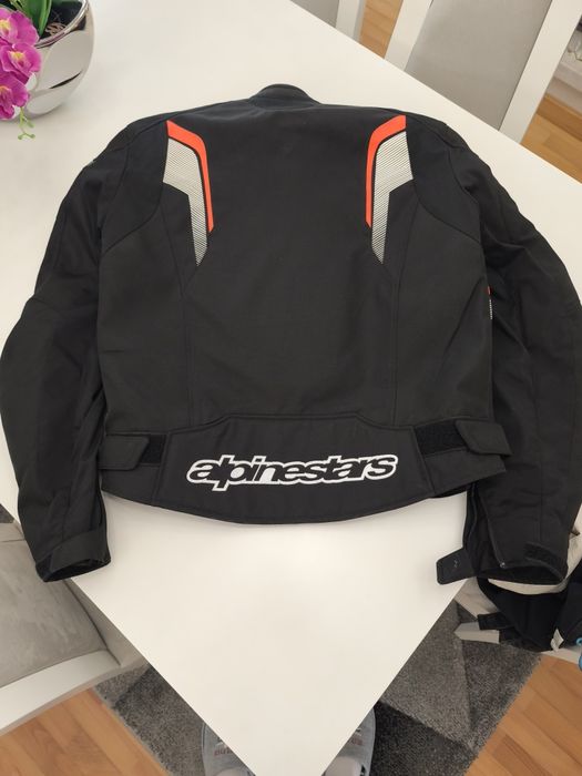 capacete, casaco e luvas mota