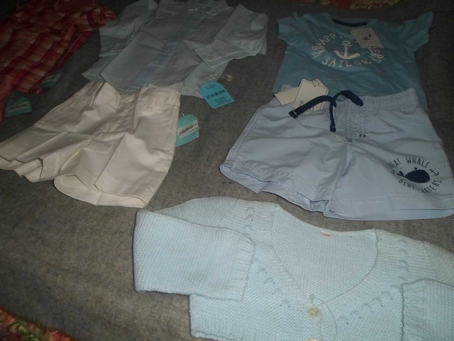 lote de roupa nova com etiqueta para bebe