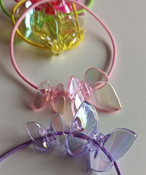 Conjunto pulseiras e elásticos borboletas