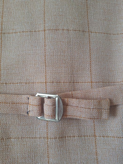 Жилетка в клітинку на хлопчика