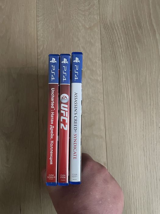 Диски PS4: Uncharted Натан дрейк колекція,Assasins creed syndicate,UFC 2