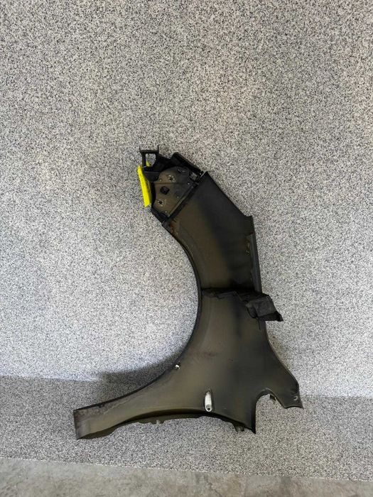 Błotnik prawy przód Opel Astra J Z190