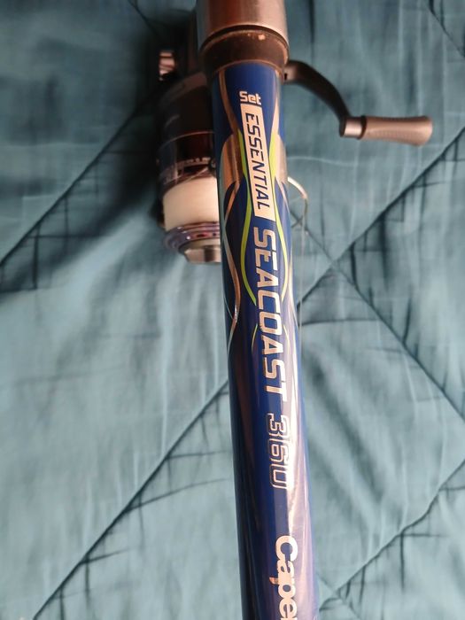 Cana de pesca + carreto + acessórios+ saco