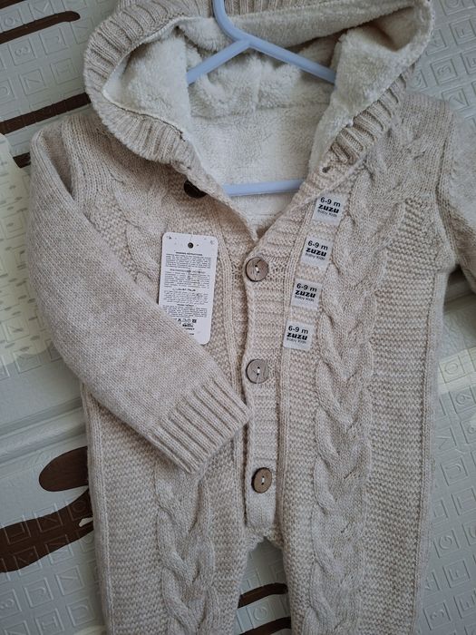 В'язаний дитячий комбінезон з хутром