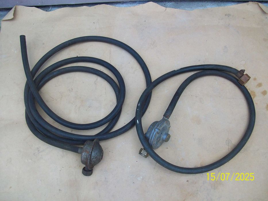 Газовий  редуктор  зі  шлангом .