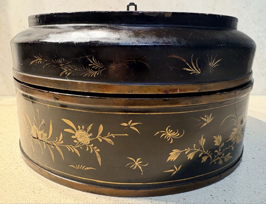 Large antique Asian lacquered box with golden floral painting
