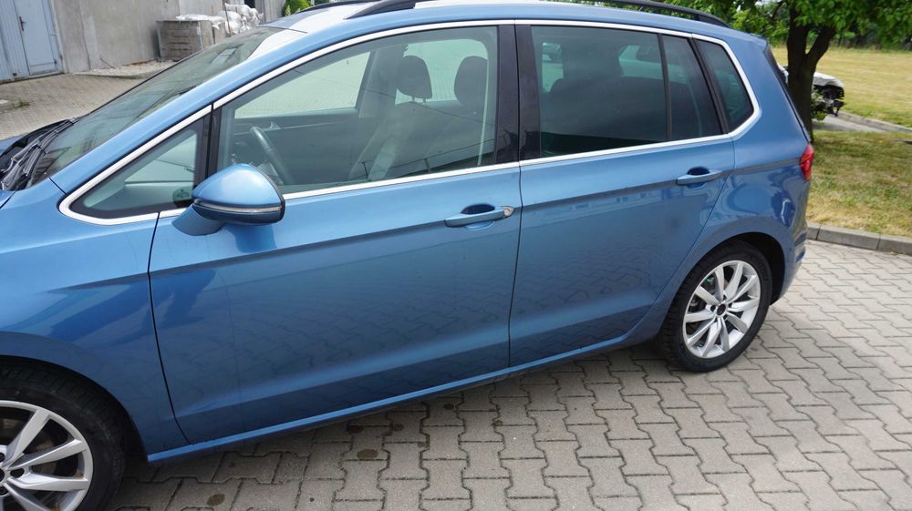 Volkswagen Golf Sportsvan błotnik tylni lewy cięty LA5J