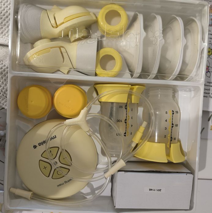 Двофазний електричний молоковідсмоктувач Medela Swing Maxi Flex