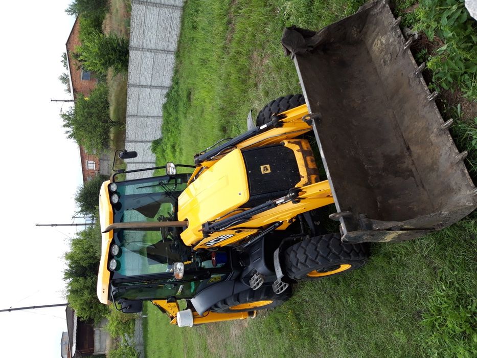 Услуги трактора JCB.