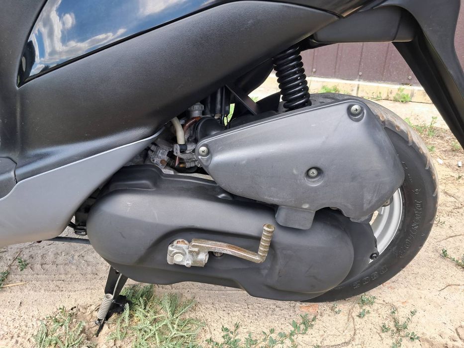 Suzuki let's із контейнера