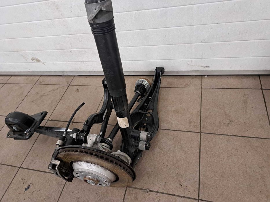 Zwrotnica Wahacz Amortyzator Lewy Tył VW Tiguan III 5WA Cupra Superb 4