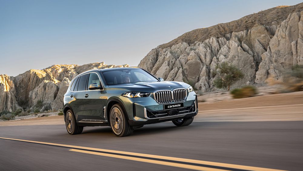 BMW X5 niebieskie od przodu z prawej strony