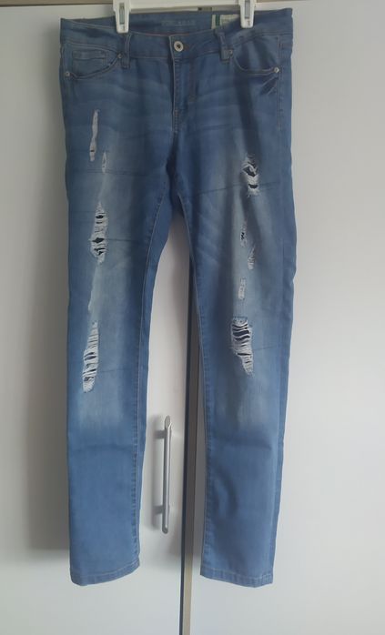 Spodnie skinny jeans z dziurami roz 31/L32