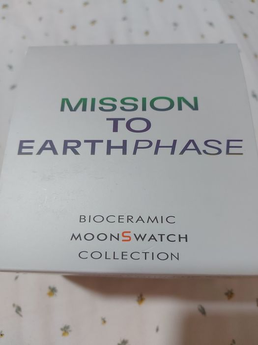 Swatch omega Earthphase