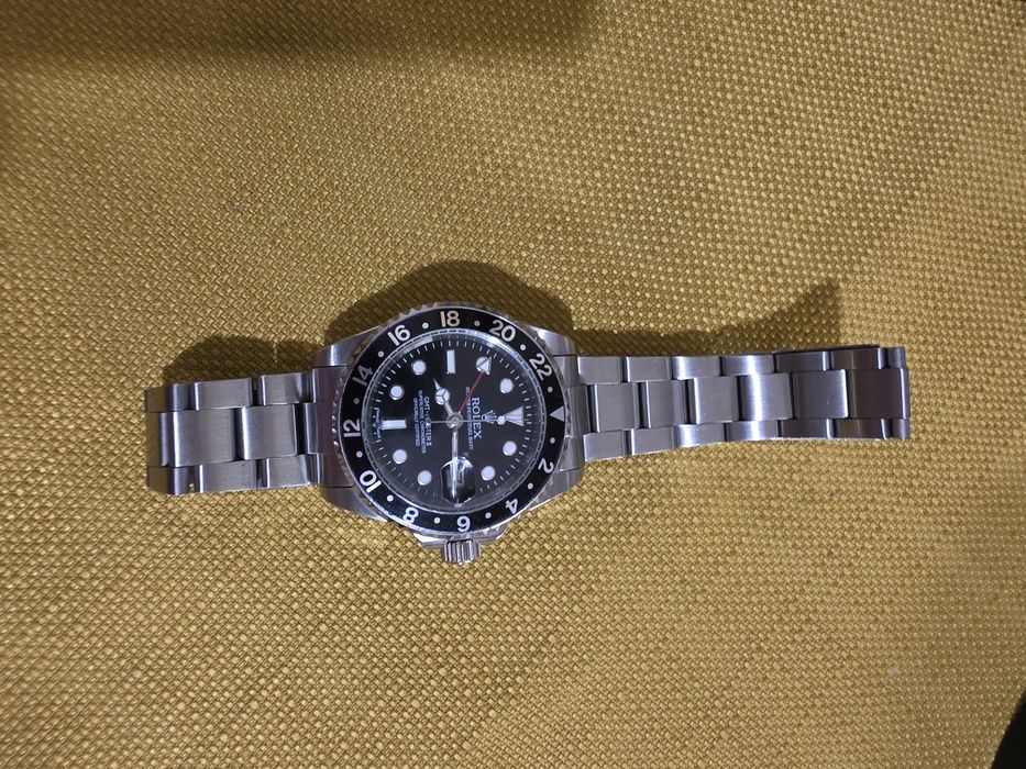 Часы Rolex в идеальном состоянии.
